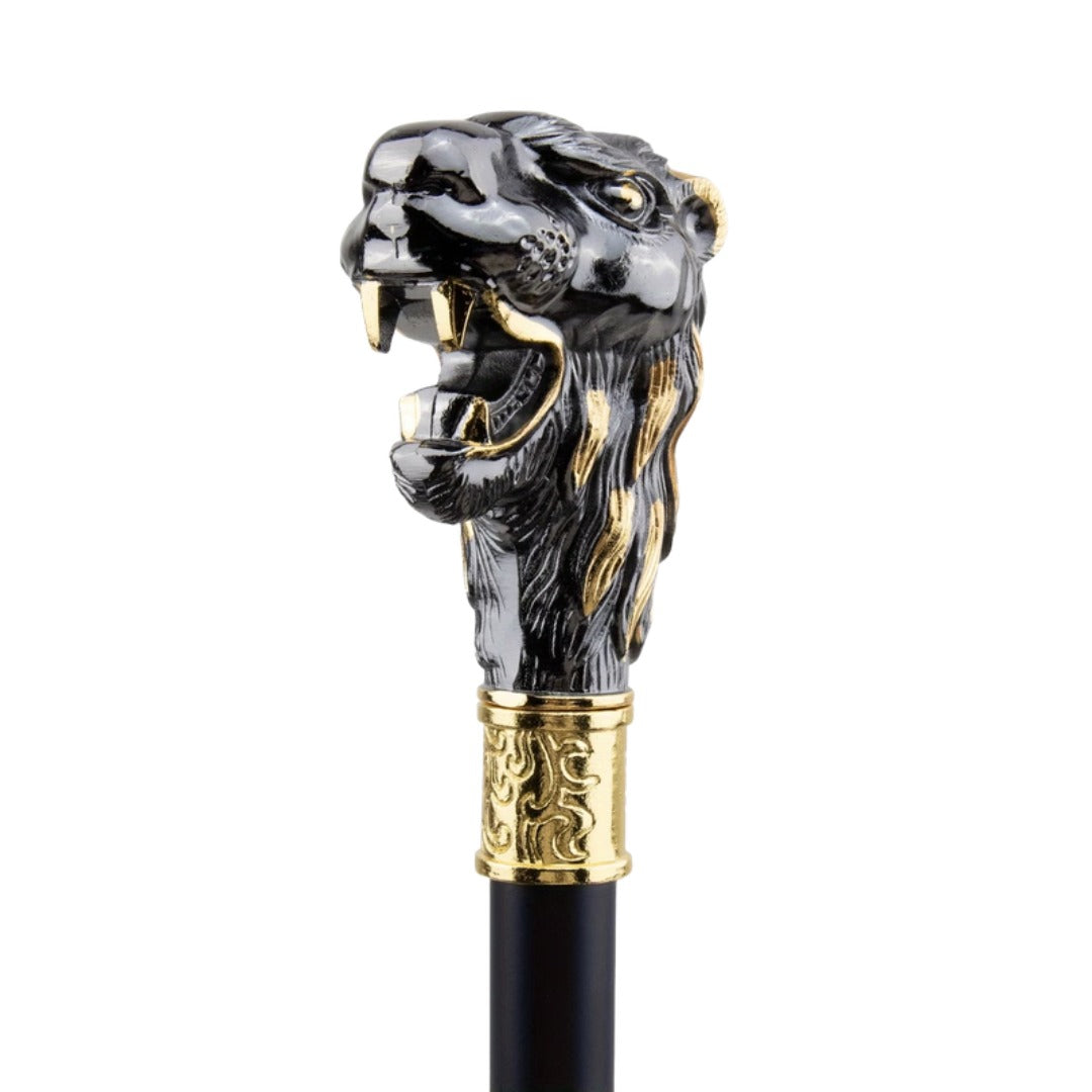Roaring lion head in black and gold, close-up