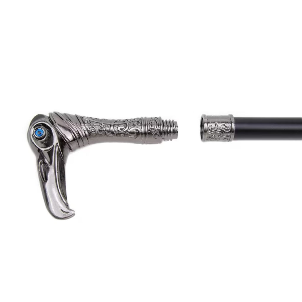 Gunmetal eagle head with engraved collar, close-up