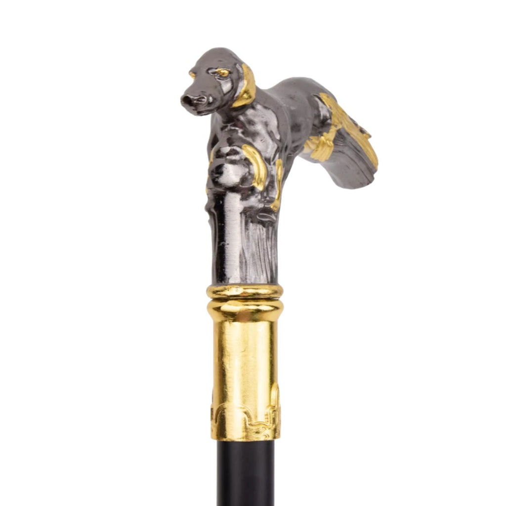 Black and gold resting hound handle detail on walking cane