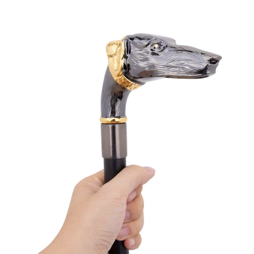 Black and gold Afghan hound head detail on walking cane
