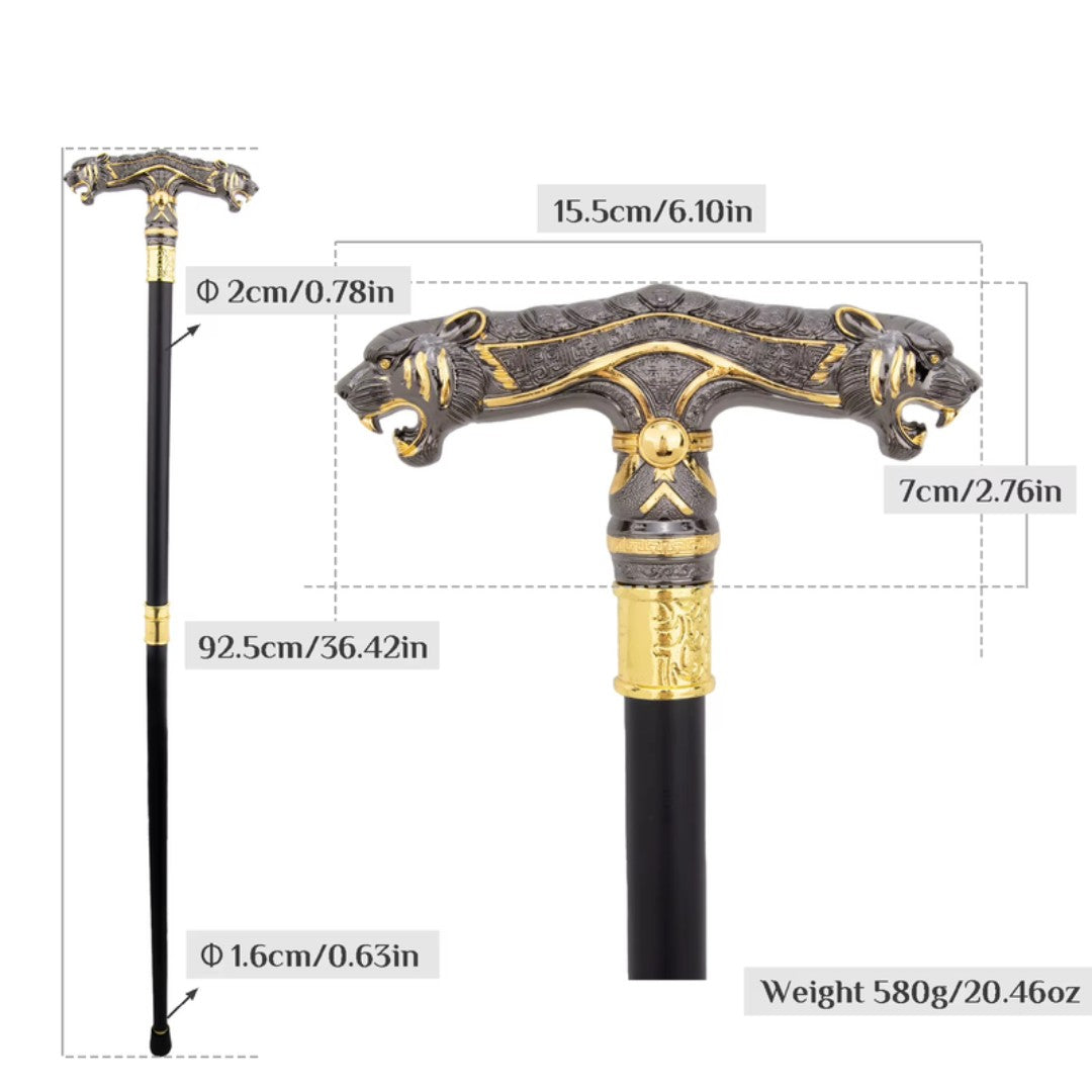 Two snarling leopard heads on double ended handle detail