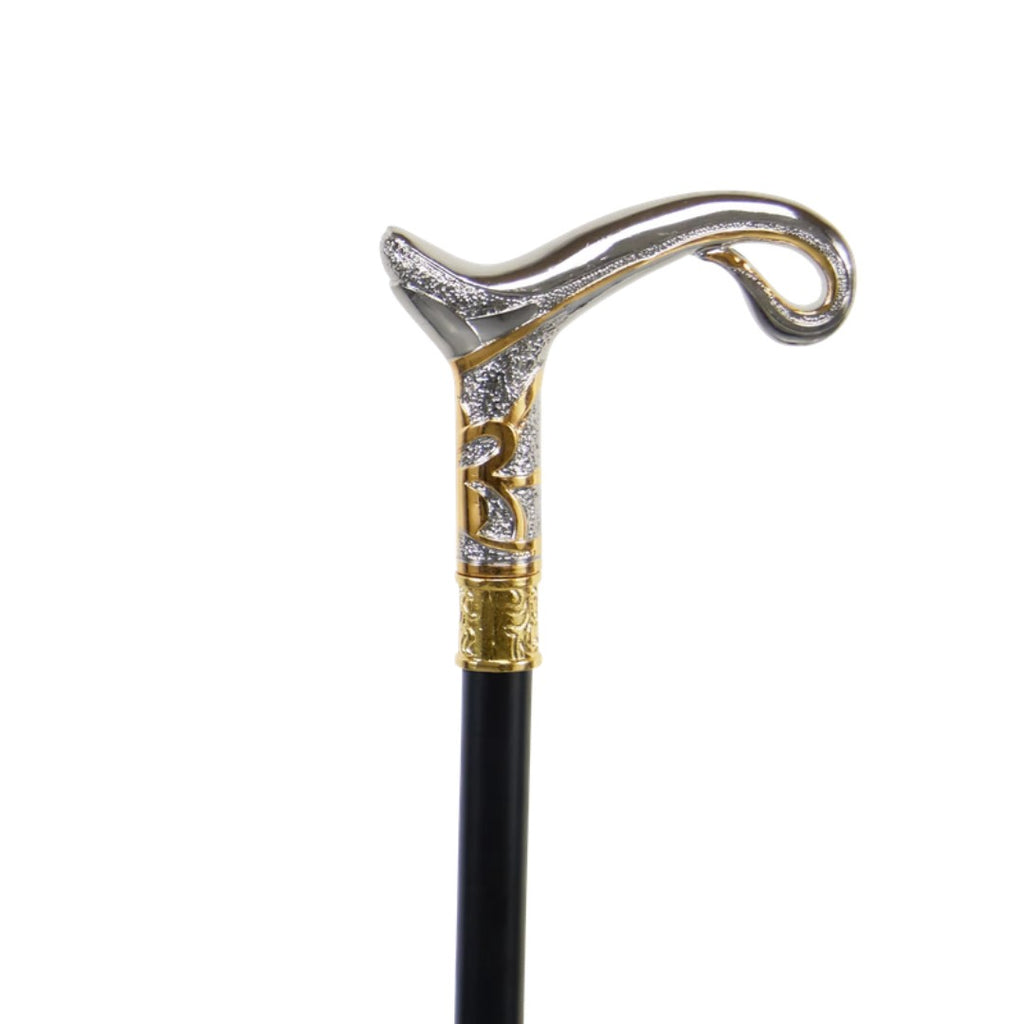 Silver and gold magic lamp curled handle detail